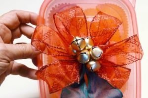 Perfect poinsettia jingle bell bow