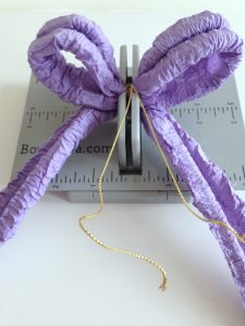 ribbon bow with bow making tool