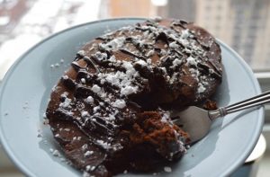 healthy chocolate pancakes and syrup