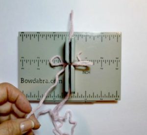 Making christmas bows with ribbon
