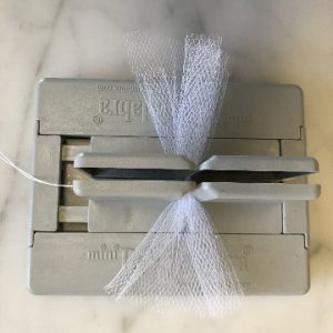Mini Bowdabra tool with bow making ribbon