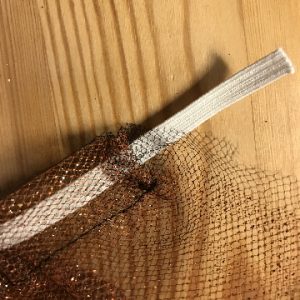 Thread Elastic through Channel in Tulle