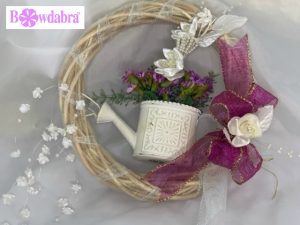 How to make an adorable spring watering can wreath with Bowdabra