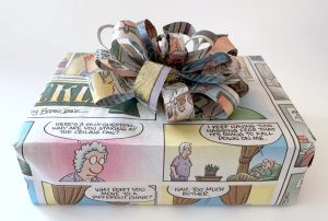 How to gift wrap with a comic strip ribbon gift bow