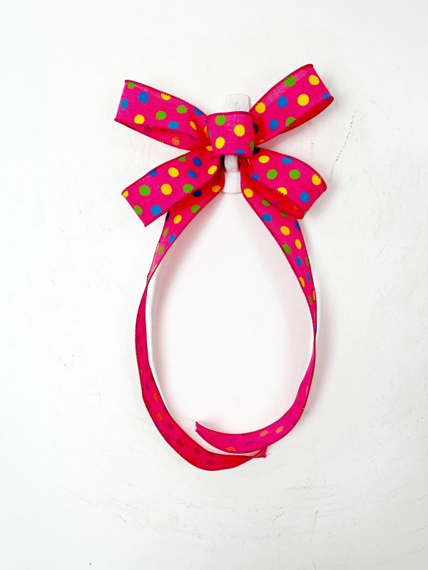 Polka dotted hot pink ribbon bow