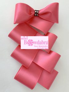 Bow with a decorative tail