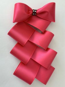 Bow with a decorative tail