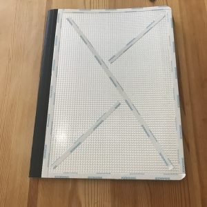 Add Adhesive to Cover of Notebook