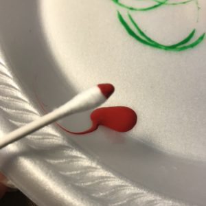 Dip Cotton Swab in Red Paint