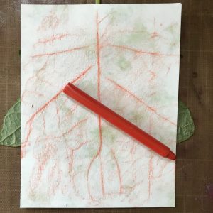 Use Flat Side of Crayon to Rub Impressions