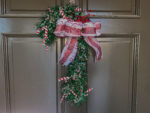 How to make an adorable dollar store candy cane wreath for under $3