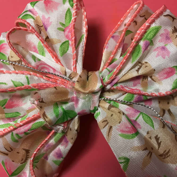 Hot Glue Folded Ribbon Ends in Place on Back of Bow