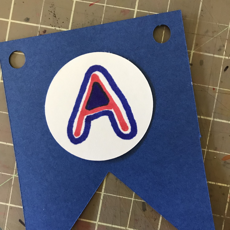 Glue Letter Circles onto Banners