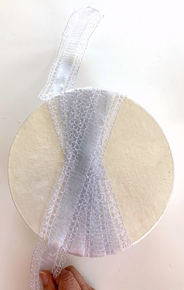How to ribbon wrap a round, wedding gift box and add a Bowdabra bow