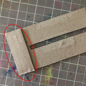 Glue Spacer on Pom Pom Loom