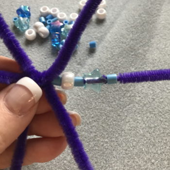 Thread Beads on Each Arm of Snowflake