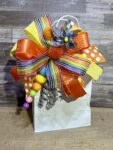 How to make simple birthday gift bags more fun with a gorgeous Bowdabra bow