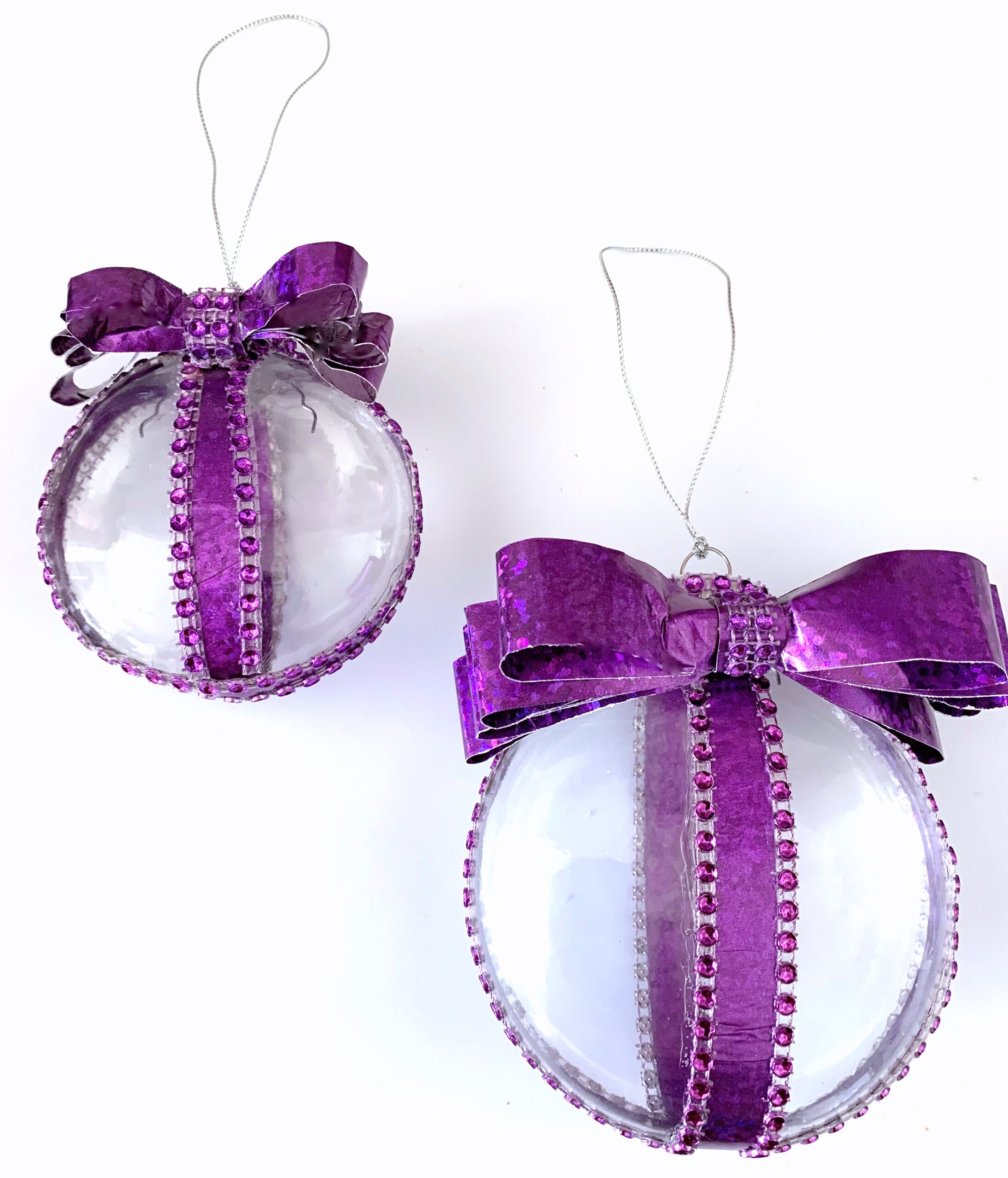 Try this revolutionary way to make a special wrapping paper ribbon ornament  : Bowdabra