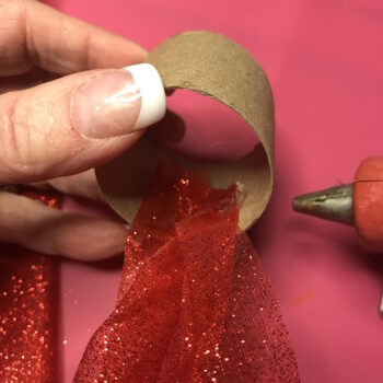 Hot Glue Gathered End of Tulle to Inside of Roll