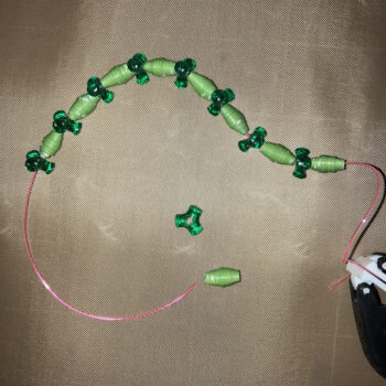 String Beads on Elastic String