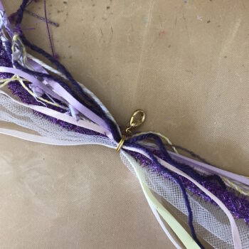 Position Clasp at Center of Ribbons